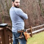 Man with Tool Belt Near Trees1