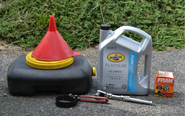 How to change oil - Oil change supplies. Oil drain pan, funnel, oil filter wrench, socket, Pennzoil full synthetic motor oil, fram oil filter 