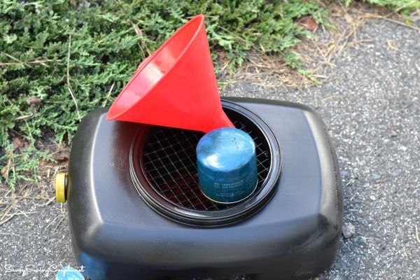 How to change oil - used motor oil and oil filter ready to be disposed of at local facility.