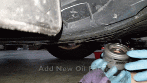 adding new oil filter to car