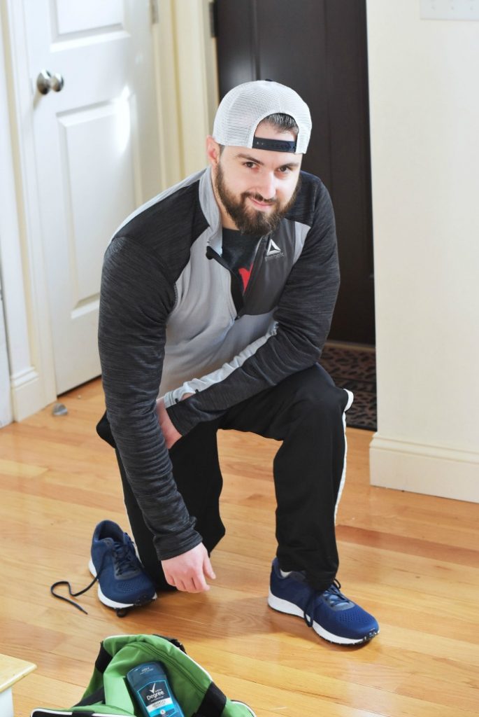 man kneeling on the floor