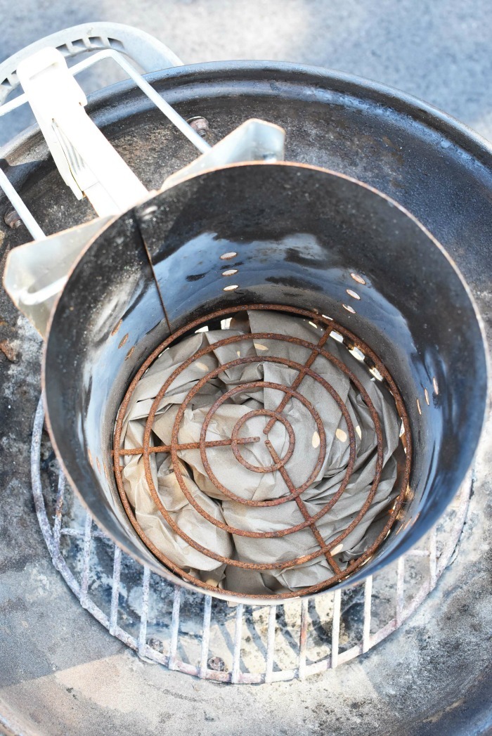 looking down into an empty charcoal chimney