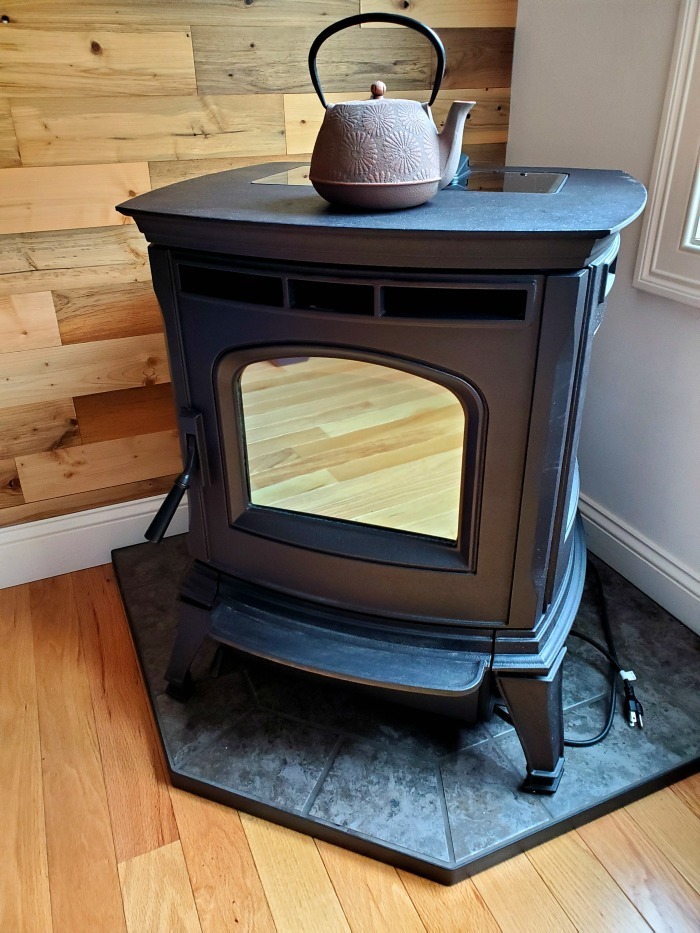 serviced harman pellet stove with kettle on it